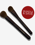 A set of two makeup brushes with brown bristles and handles. A red dot says 'BUNDLE & SAVE'