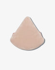 Underside view of the TJ triangular pink velvet powder puff.