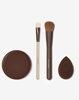 Makeup brush set with two brushes, a Bronzer and a sponge applicator on a white background.