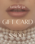 tanielle jai - Gift Card in gallery position 1 featuring close-up lips with layered pearl necklaces and soft makeup lighting