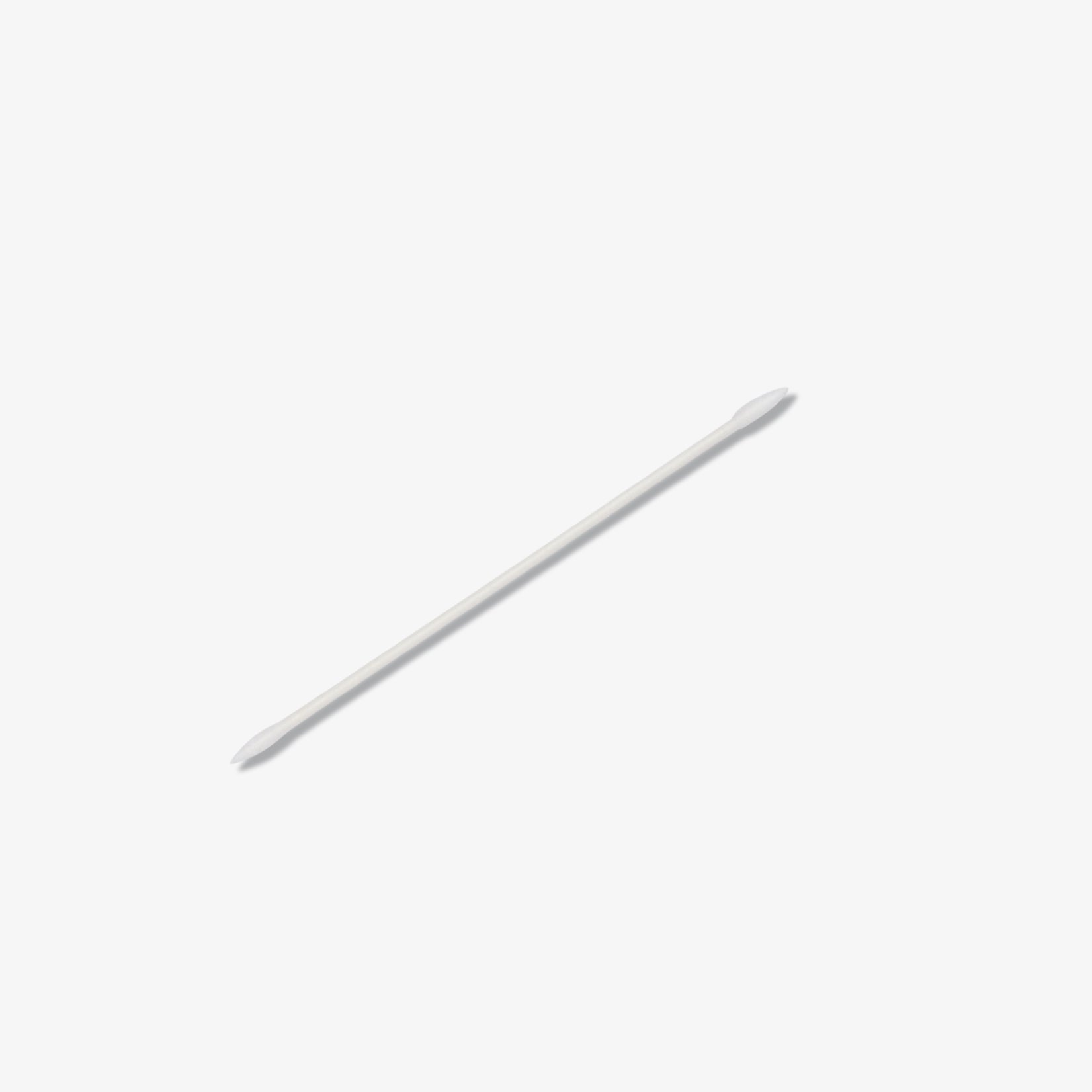 A precision pointed cotton tip on a white background