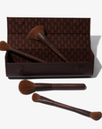 Tanielle Jai Vegan leather brush clutch with magnetic closure open, displaying four iconic VOL.2 Brushes