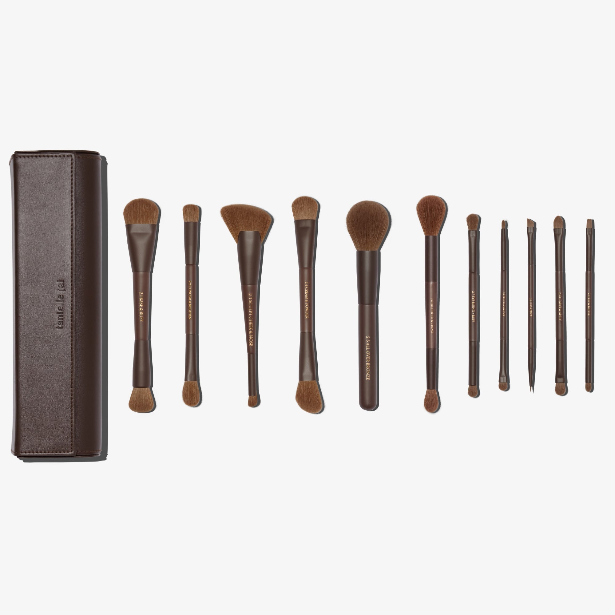 A set of 11, mostly dual-ended makeup brushes with brown handles and hypoallergenic synthetic bristles, displayed alongside a brown vegan magnetic brush clutch.