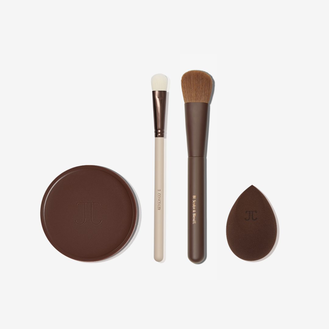 Makeup brush set with two brushes, a Bronzer and a sponge applicator on a white background.