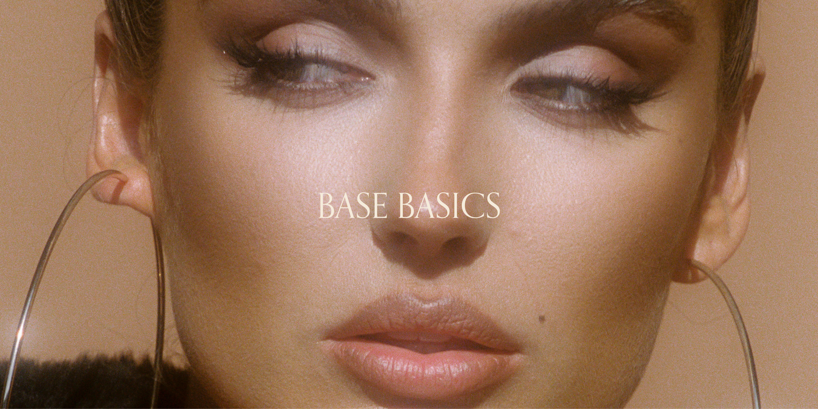 Promotional image featuring a close-up of a person's face with the text 'BASE BASICS' overlayed, indicating the course name.